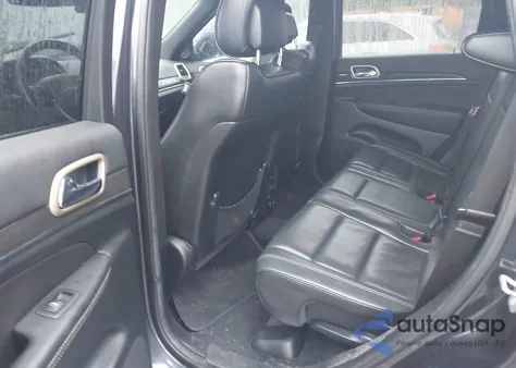 2014 Jeep Grand Cherokee Overland z USA, uszkodzony, nr VIN 1C4RJECTXEC330841